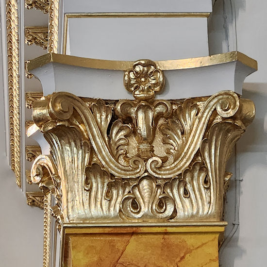 A gilded figure casting